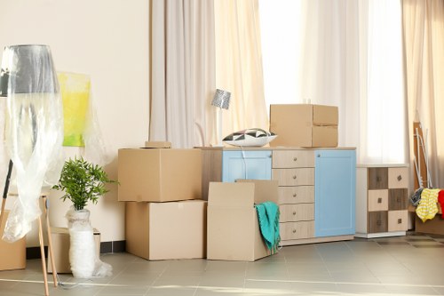 Careful loading of household furniture during a Loxford move