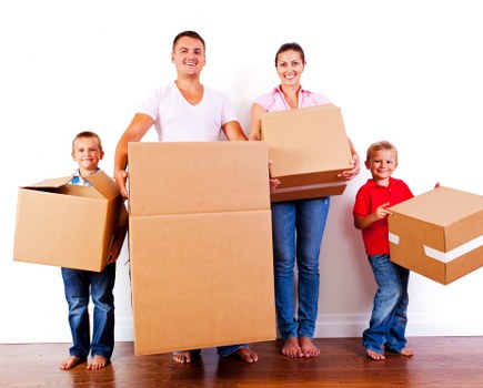 Packed boxes and furniture ready for removals van transport