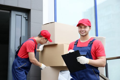 Removal van and moving boxes for a house move in Loxford