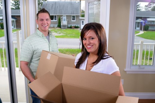 Home removals team helping with a residential move in Loxford