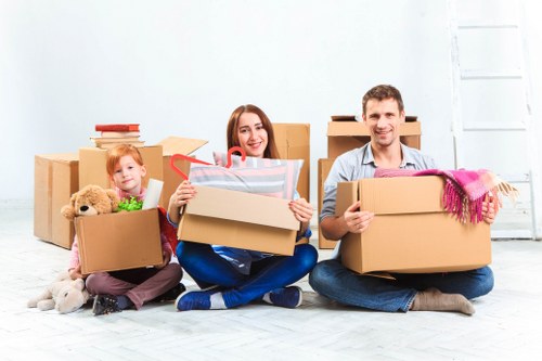 Team loading unwanted furniture during a Loxford pick-up