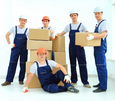 Loading household furniture for a move in Loxford