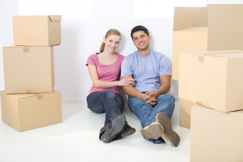 Local removal team handling boxes and household items in Loxford