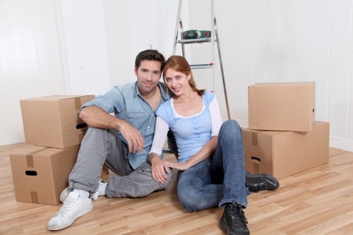 Professional movers carrying items safely for Man With Van Loxford