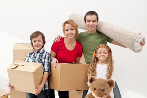 Loading household items into a van for a local move in Loxford