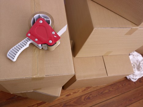 Removal team loading furniture for a Loxford relocation