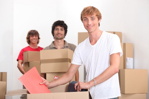 Professional movers handling a flat removal in Loxford