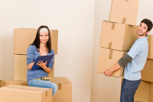 Packed household boxes ready for house removals in Loxford